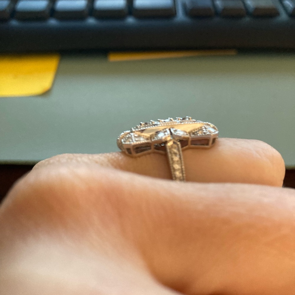 Womens white gold Art Deco diamond ring.